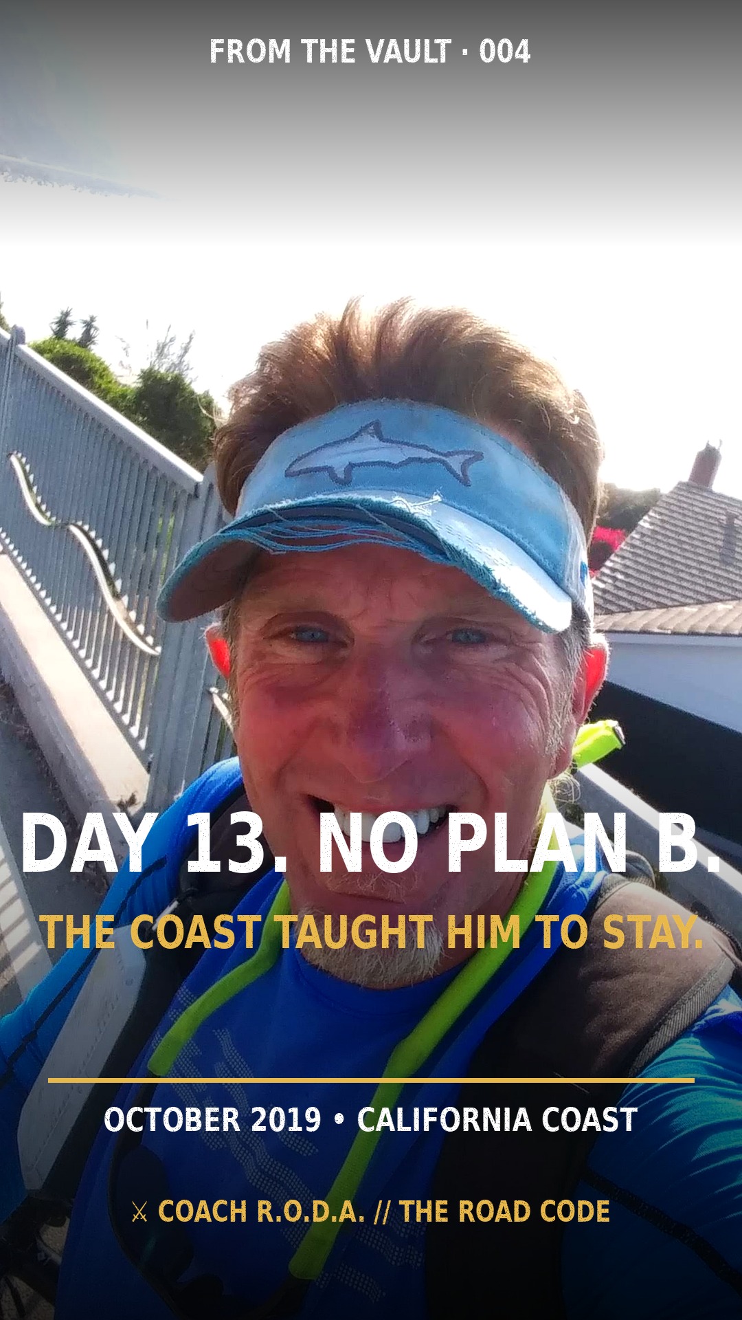 Real photo: Coach RODA smiling on a coastal bridge in his shark visor, California coast, Oct 10, 2019 — day 13 of his first tour